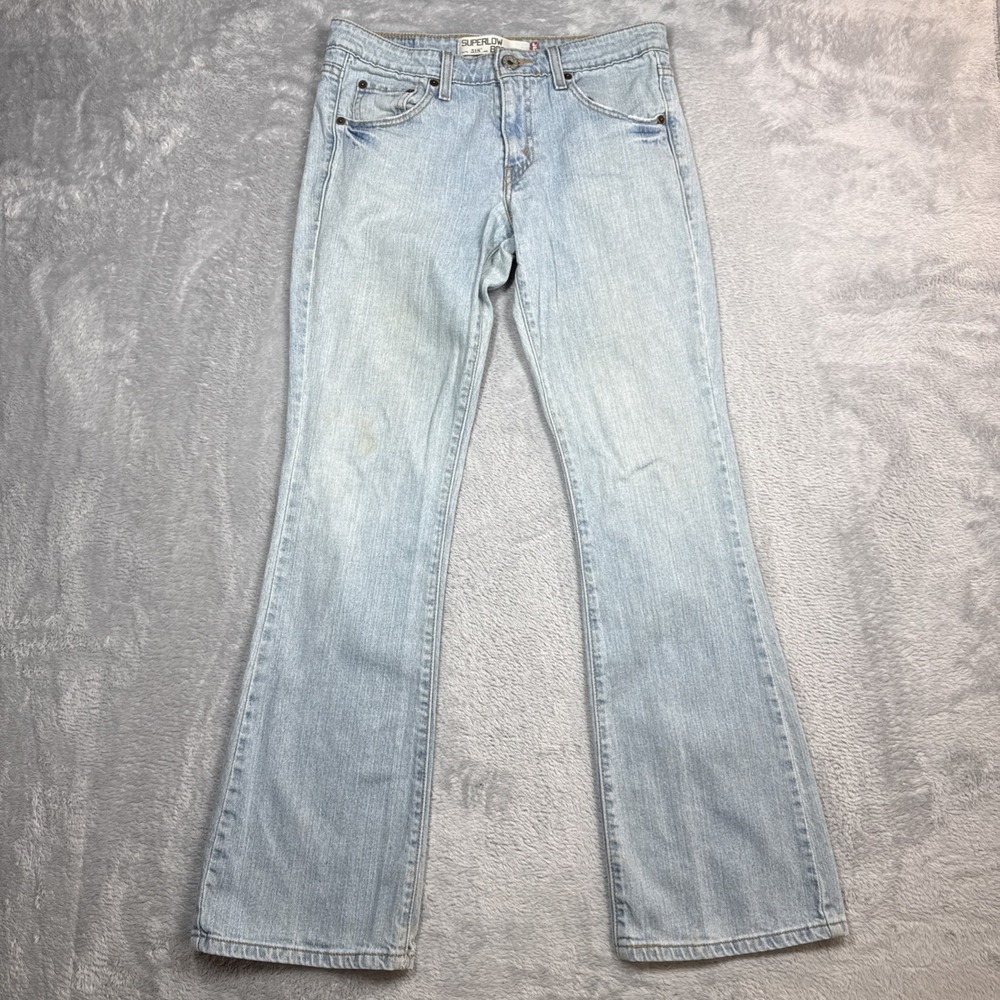 Vintage Levi's 518 Superlow Bootcut Jeans 31x31 Blue Light Wash Low Rise Stained